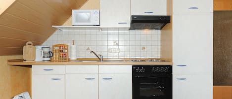 Fridge, microwave, oven, high chair