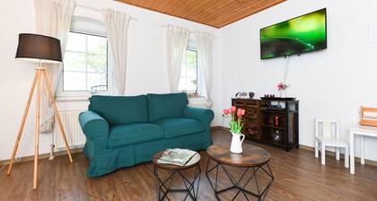 Ferienwohnung Pfingstrose - Ferienwohnungen auf dem Bauernhof Schmidt