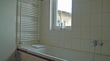 Bathtub, hair dryer