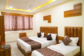 Deluxe Triple Room | Desk, free WiFi - Hotel The Grand (Ahmedabad)