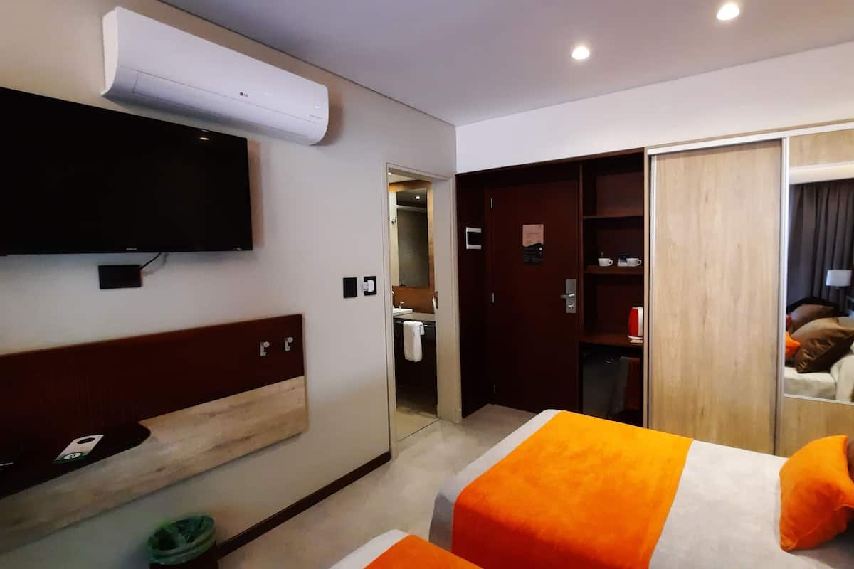 Basic Double or Twin Room | 2 bedrooms, in-room safe, desk, blackout drapes