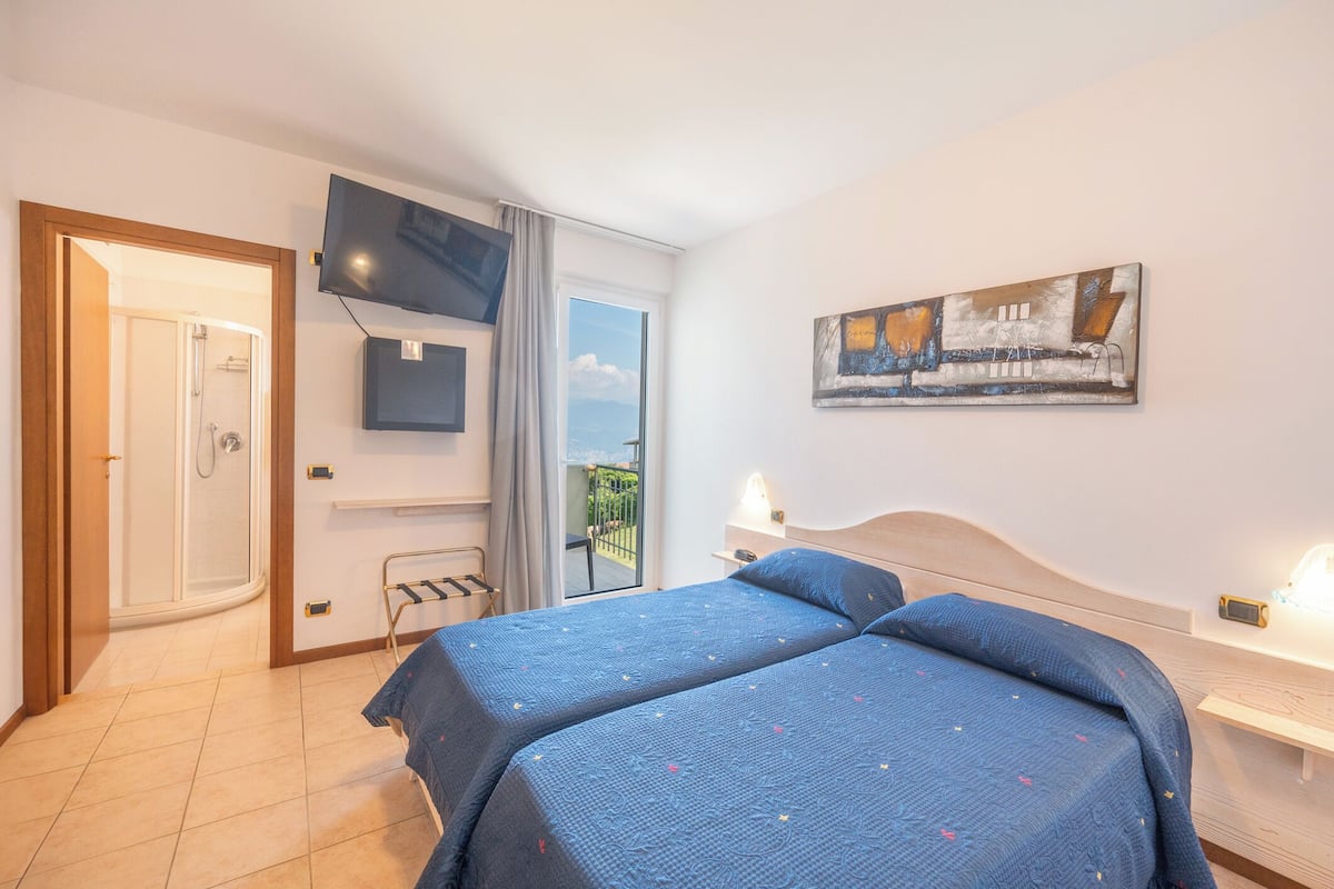 Chambre Double Ăconomique | 1 chambre, draps en coton Ă©gyptien, literie de qualitĂ© supĂ©rieure