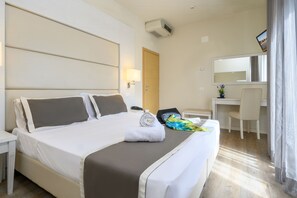 Family Quadruple Room, 2 Bedrooms | In-room safe, desk, free WiFi, bed sheets - Hotel ATLAS (Riccione)