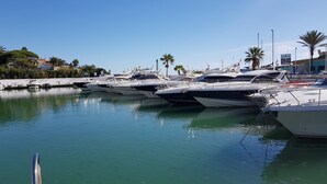 A marina with several yachts docked. - D13-2 Cabopino (Marbella)