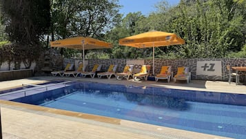 Outdoor pool, pool umbrellas, pool loungers