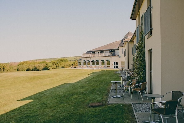 Quarto casal superluxo | Vista para o campo de golfe