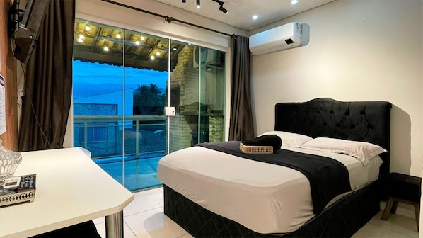 Individually furnished, desk, laptop workspace, iron/ironing board