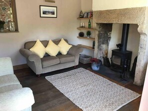 Cottage | Living room | 30-inch TV with digital channels, fireplace