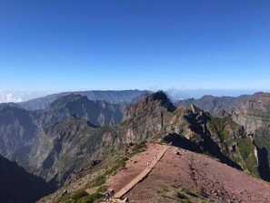 A mountain landscape with a clear sky.