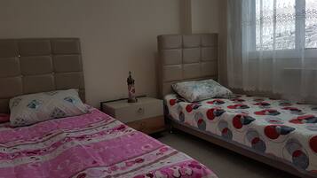 Apartment, 2 Queen Beds | 2 bedrooms, iron/ironing board, free WiFi, bed sheets