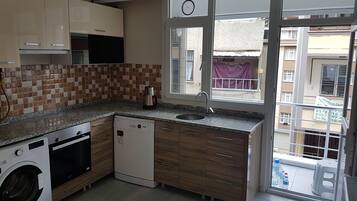 Apartment, 2 Queen Beds | Private kitchen | Fridge, microwave, oven, stovetop