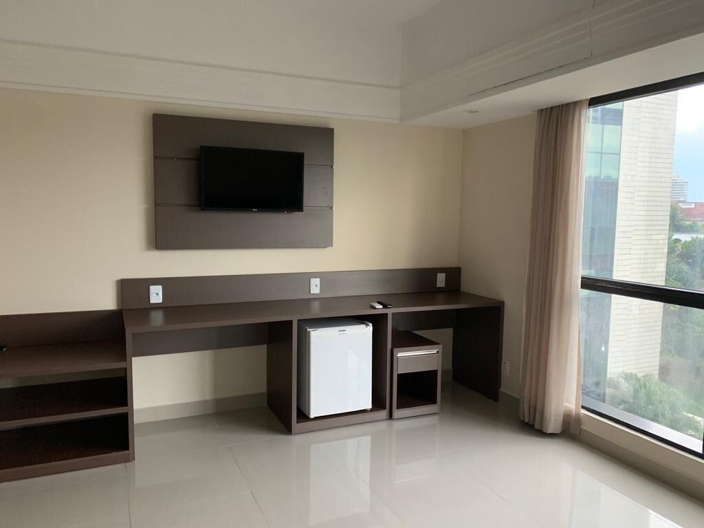 room 403 flat | living area | 32-inch tv with satellite channels