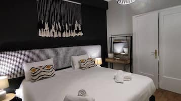 Apartamento | Wi-Fi de cortesia, roupa de cama