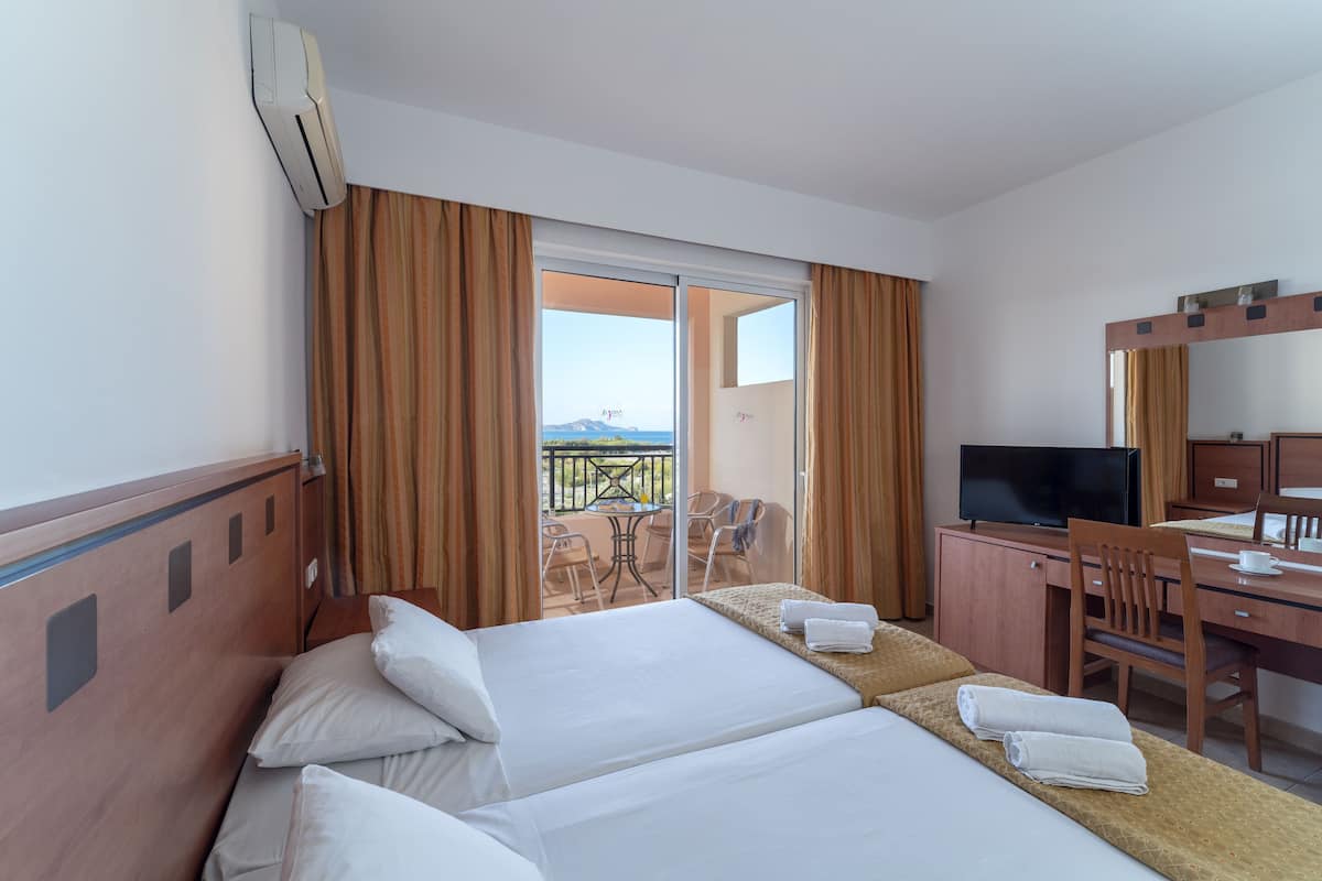 Classic Double or Twin Room, Sea View | In-room safe, desk, laptop workspace, blackout drapes