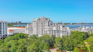 front of building. Behind is bay. To left is Baytowne Conference Center & Effie.