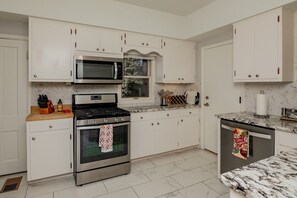 Fridge, microwave, oven, stovetop - Fort Collins Historic Restored Home - Walk to Old Town (Fort Collins)