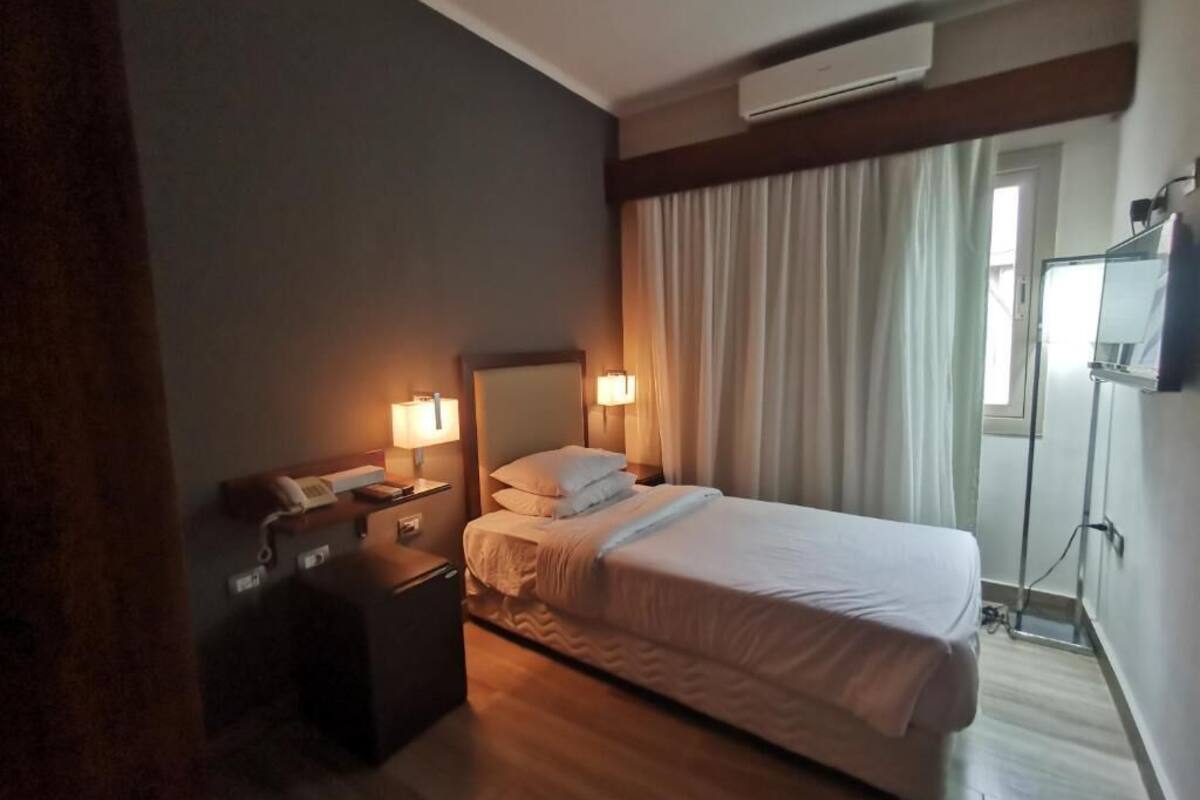 Egyptian cotton sheets, premium bedding, minibar, blackout drapes