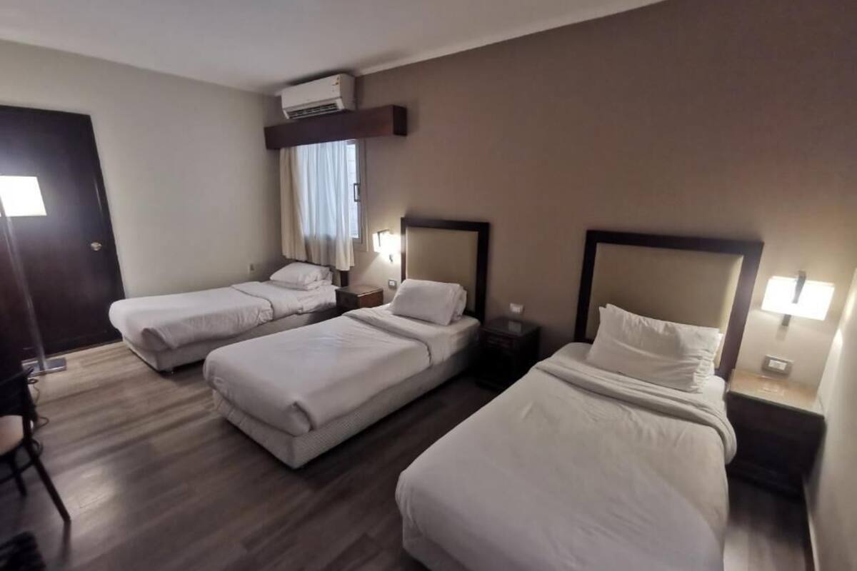 Egyptian cotton sheets, premium bedding, minibar, blackout drapes