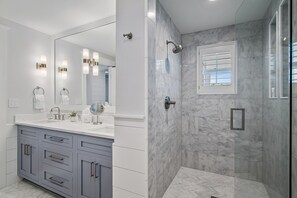 Bathtub, hair dryer, towels, soap
