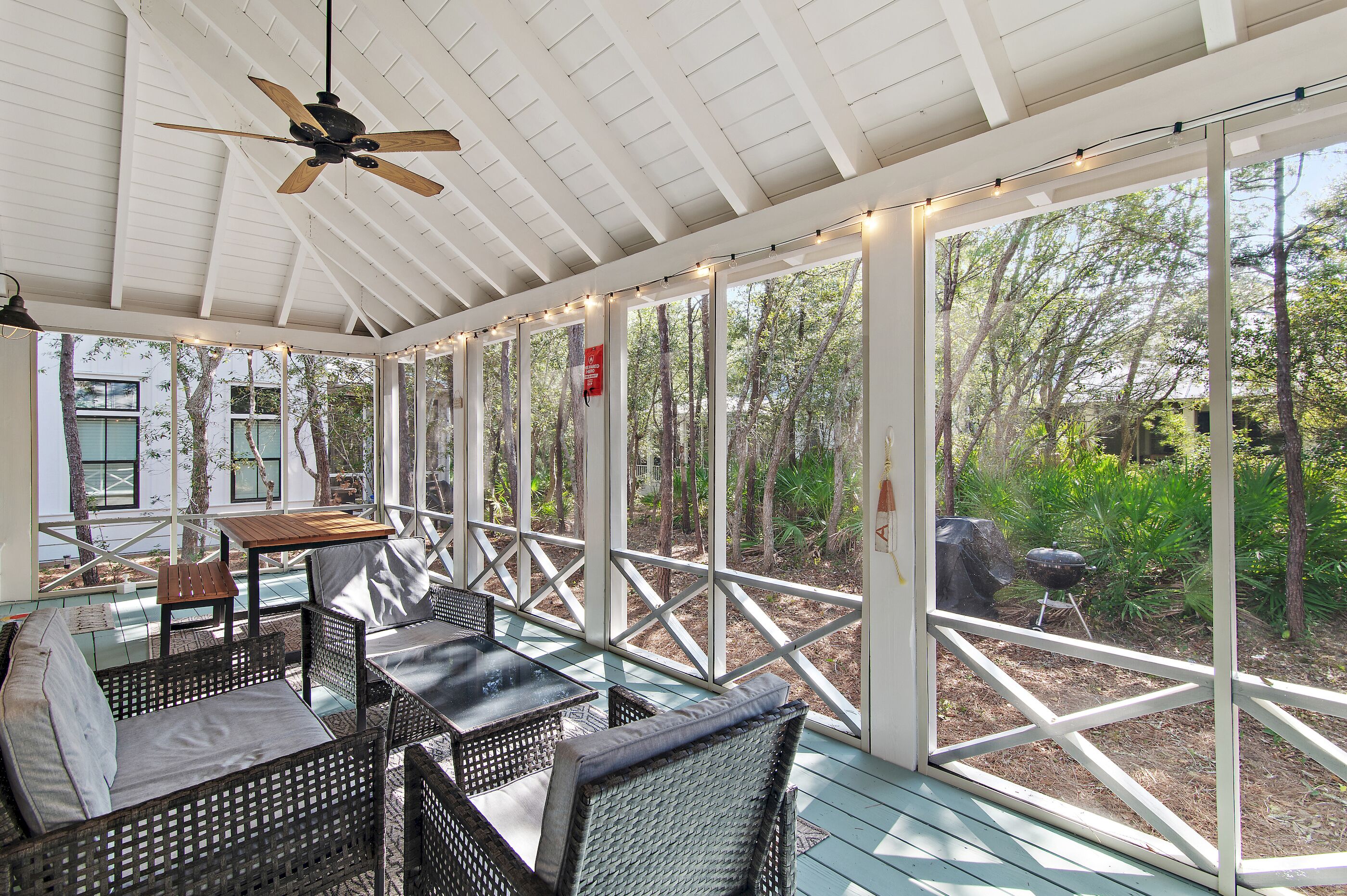 Relax in the screened-in back patio or enjoy a cookout on one of the grills.
