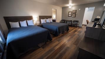 Deluxe Room, Multiple Beds | Desk, laptop workspace, blackout curtains, cots/infant beds