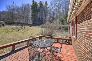 Outdoor dining - Quaint Creekside Home w/ Spacious Deck & Yard (Atkins)