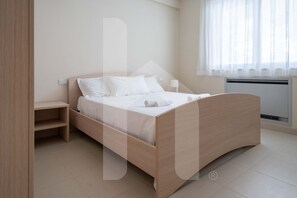 2 bedrooms, travel cot, WiFi, bed sheets