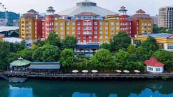A large hotel with multiple floors and a distinctive central dome structure.