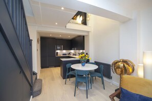 Dining area with views up to the back bedroom