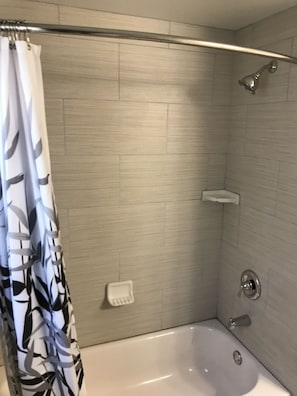 Combined shower/tub