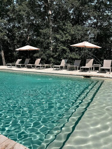 Water's edge, gated community, private dock with toys, community pool, hot tub