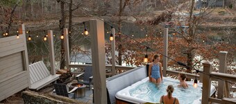 Water's edge, gated community, private dock with toys, community pool, hot tub