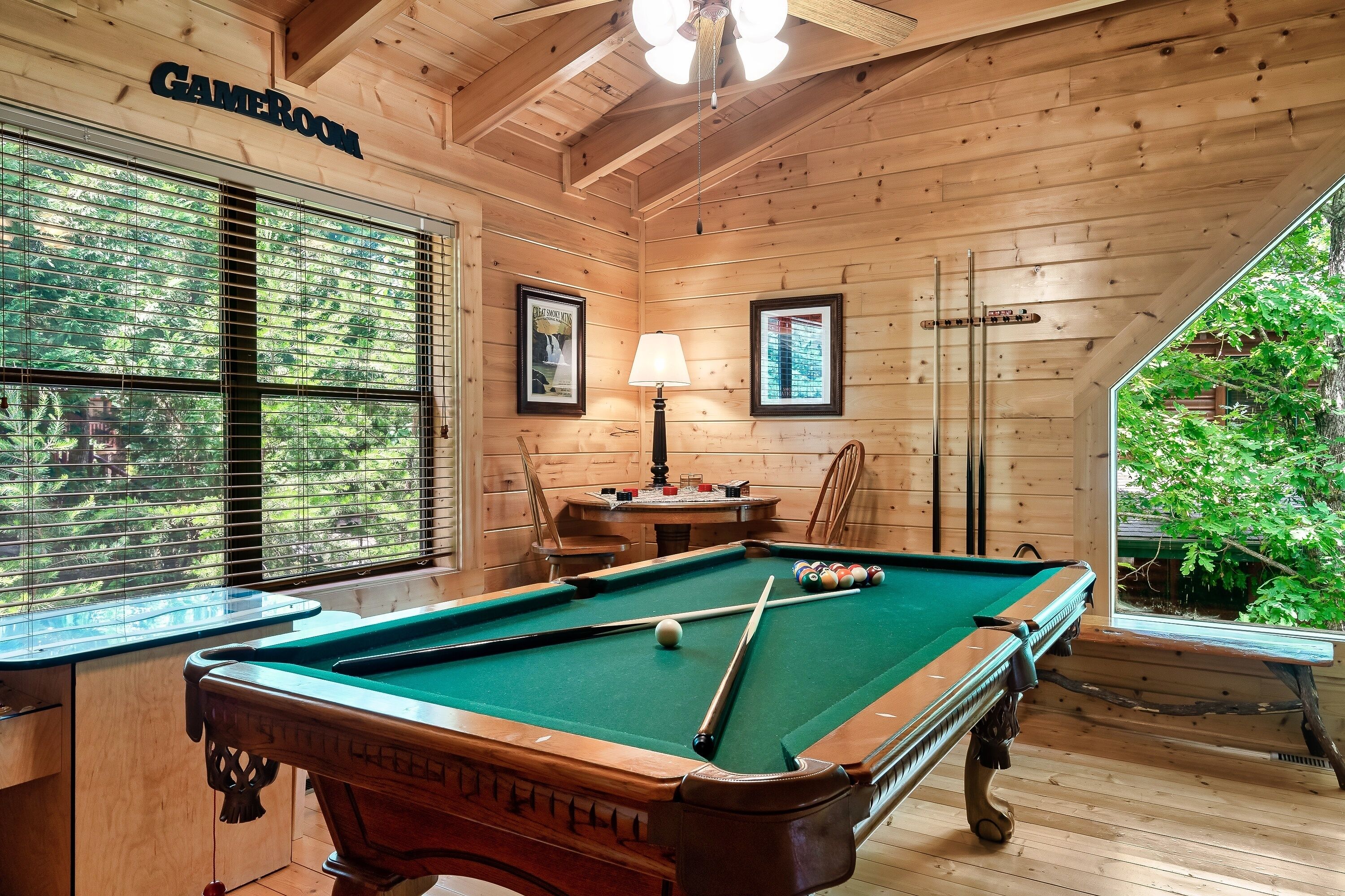 Fun game room with pool table in the upstairs loft