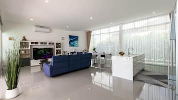 Family Villa | Private kitchen | Fridge, coffee/tea maker, electric kettle, highchair