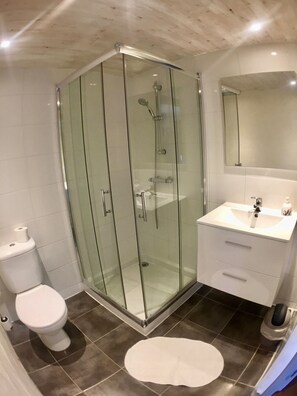 Bathtub, hair dryer, towels, soap