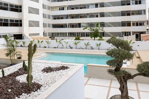 Outdoor pool, open 10:00 AM to 8:00 PM, pool umbrellas, sun loungers