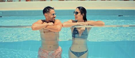 Outdoor pool, open 10:00 AM to 8:00 PM, pool umbrellas, sun loungers