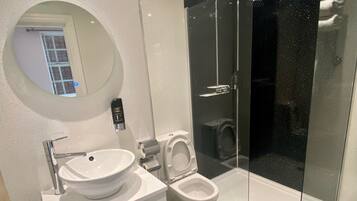 Shower, free toiletries, hair dryer, towels