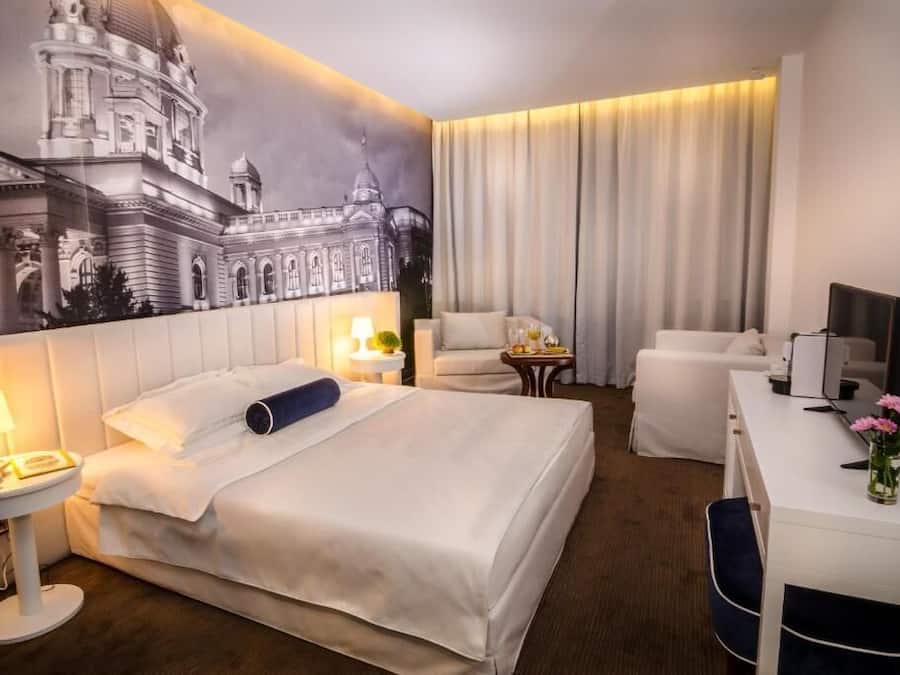 Premium bedding, memory foam beds, desk, laptop workspace