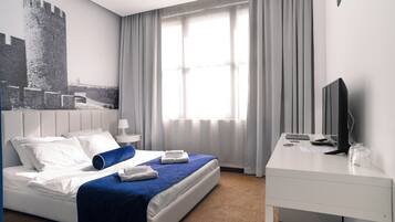 Deluxe Room | Premium bedding, memory foam beds, desk, laptop workspace