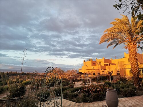 Maisonette with terrace in riad with swimming pool and farmhouse