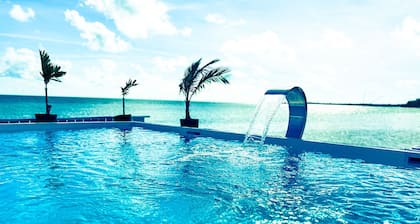 Ocean Front Private Retreat 4 Apt Suites w Pool Sleeps 18