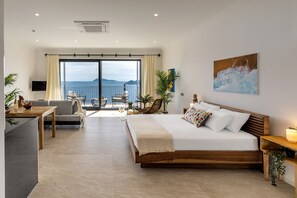 Deluxe-Apartment, 1 Queen-Bett, Veranda, Meerblick | Bettwäsche aus ägyptischer Baumwolle, hochwertige Bettwaren