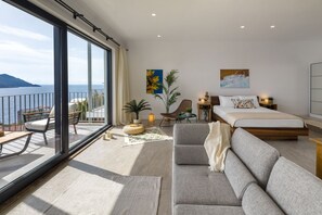 Deluxe-Apartment, 1 Queen-Bett, Veranda, Meerblick | Bettwäsche aus ägyptischer Baumwolle, hochwertige Bettwaren