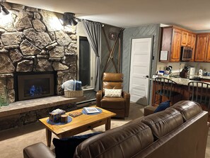 Smart TV, fireplace, DVD player, books