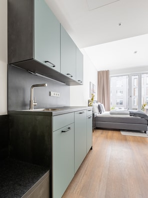 Suite M | Cozinha privada | Geladeira, cooktop, máquina de café expresso, cafeteira/chaleira