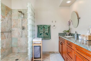 Shower, hair dryer, towels, soap