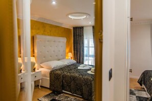 Habitación clásica con 1 cama doble o 2 individuales | Minibar, escritorio, wifi gratis y ropa de cama