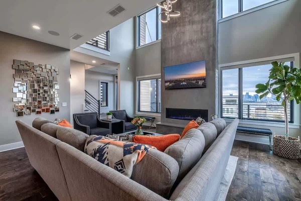 Welcome to the Alistair House, a modern mansion with hot tub, skyline views and multiple decks overlooking all of Nashville.