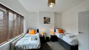 Desk, iron/ironing board, travel cot, free WiFi